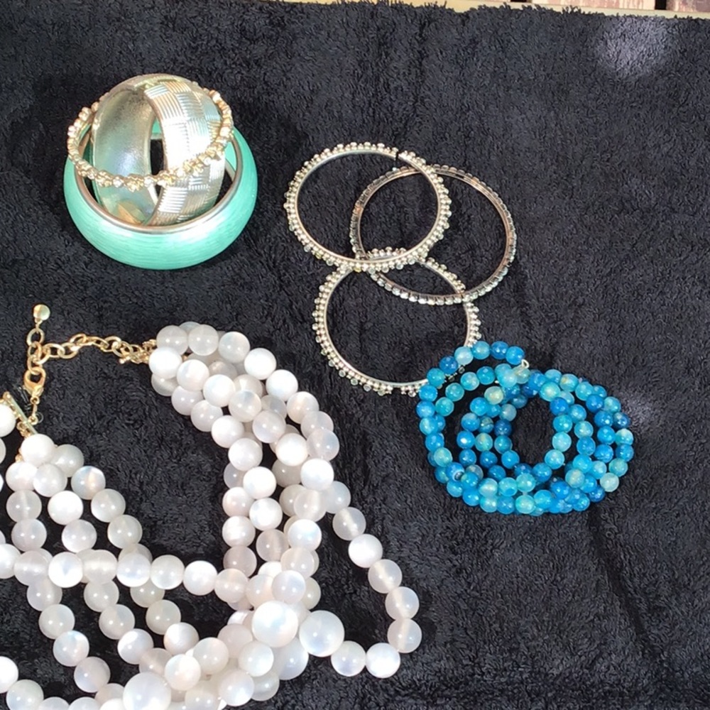 Lot of eight bulky diva costume jewelry